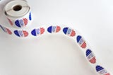 A sheet of red, white, and blue “I voted” stickers.