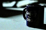 A blue mug on a table