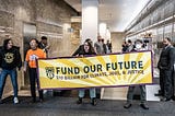 Activists Stage Sit-In at Governor’s Office demanding that Governor Hochul ‘Fund our Future’
