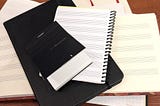 Music practice notebooks of varying types and sizes
