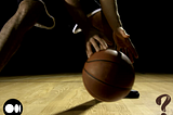 Black basketball athlete dribbling basketball, and image displaying Medium logo on lower left and question mark on lower right sides of photo.