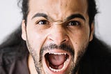 screaming man with mouth open