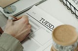 Student creating a study schedule using a notebook and laptopHow to Create a Study Schedule You’ll…