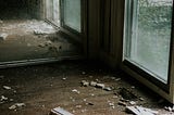 debris lying on floor of destroyed building