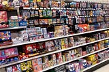 A stocked shelf of sports cards at a Target store.