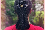 Long hair in a braided updo with a flexi hair clip