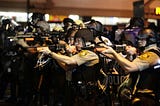 Ferguson police threaten the public