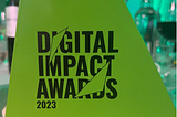 Digital Impact Awards 2023 — Gold Best Digital Accessibility: The trophy is green and in a triangular shape.