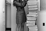 Hamilton in 1969, standing next to listings of the software she and her MIT team produced for the Apollo projec