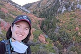 Photo of a woman in the mountains.