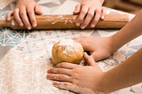 Hands baking cakes