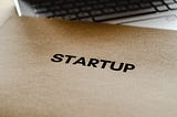 Image of envelope with Startup written on it with laptop Photo by Eva Bronzini