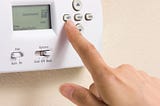 What temperature should you set your thermostat to for cooling and heating?