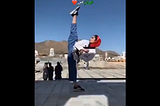 An Iranian girl shooting a martial arts practice video while being oppressed