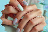 Close-up of butter glazed nails with a creamy, shiny finish in soft pastel hues, showcasing elegance and sophistication.