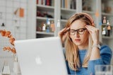 picture of a lady in her home office