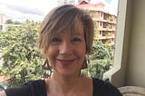 A photo of the author in 2016 on an apartment terrace in Phnom Penh, Cambodia