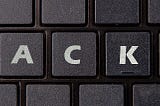 keyboard that has word h-a-c-k written on 4 keys.