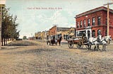 A color, antique postcard of Main Street, Miller, South Dakota
