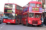 London’s iconic red buses. Photo from Wikipedia by Jon Bennett