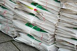 Old newspapers can be reused and recycled towards a circular economy of paper