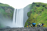 Skogafoss waterfall with two bicycles in front