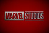 Marvel Studios’ silver logo, with a red background and faded black corners.