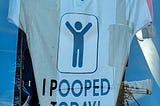 Photo of a T-shirt proclaiming I pooped today.