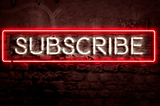 “subscribe” in neon lights