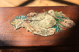 photo of a decoration on a wooden box