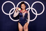 Suni Lee Makes Headlines as the First Asian American Woman to Win Gold in the Olympics