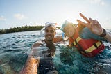 2 people snorkeling on the sea surface, snorkeling in andaman