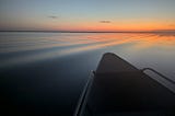 Sunrise over the Rio Negro near Tumbira, Brazil in the Amazon river basin (photo by Dave Thau)