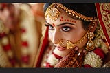 A beautiful Indian bride adorned in traditional attire.