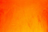 Firey red and yellow image like paint merging together