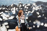 Happy women wearing bright cardigan and brown scarf