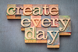 Wood block lettering which says create every day
