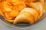 Crisps all alike on a tray ready to be eaten