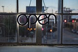 ‘Open’ sign in window