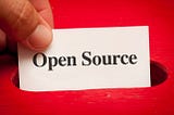 What is an open source project and how can a beginner contribute to it?