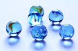 Six blue marbles