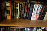 a bookshelf full of Stephen King books