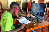 Students and professionals celebrate the reopening of public library in Dondo, Mozambique