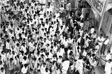 Kaushal Ji stands ( with his hands stretched out) along with Atal Ji on the jeep.