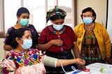 A group of comadronas in Quetzaltenango participate in a training on how to use equipment provided by the project to help them care for pregnant women in their community.