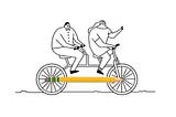 Um homem e uma mulher andando de bicicleta, em que a correia é um lápis.