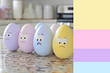Easter eggs on a kitchen counter with the matching color palette.