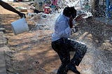 Spring, Buckets of Water and… Celebration?