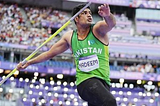Arshad Nadeem prepares to launch the javelin at the 2024 Olympics in Paris.