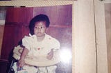 Six months old me sitting pretty and uninterested in what the world thought of my name